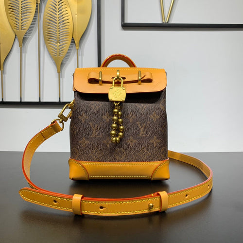 Louis Vuitton STEAMER 20 IN BROWN MONOGRAM DUST CANVAS AND CALFSKIN TRIM GOLD HARDWARE