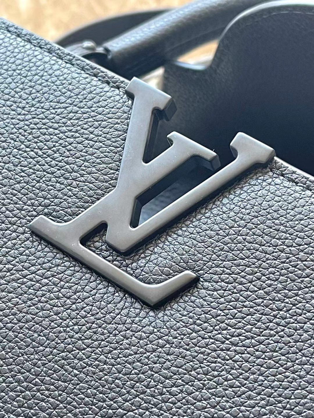 Louis Vuitton CAPUCINES EAST-WEST 27 IN BLACK TAURILLON