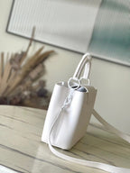 Louis Vuitton CAPUCINES EAST-WEST BB 27 IN WHITE TAURILLON
