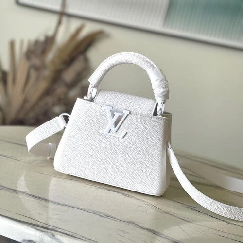Louis Vuitton CAPUCINES EAST-WEST MINI 21 IN WHITE TAURILLON