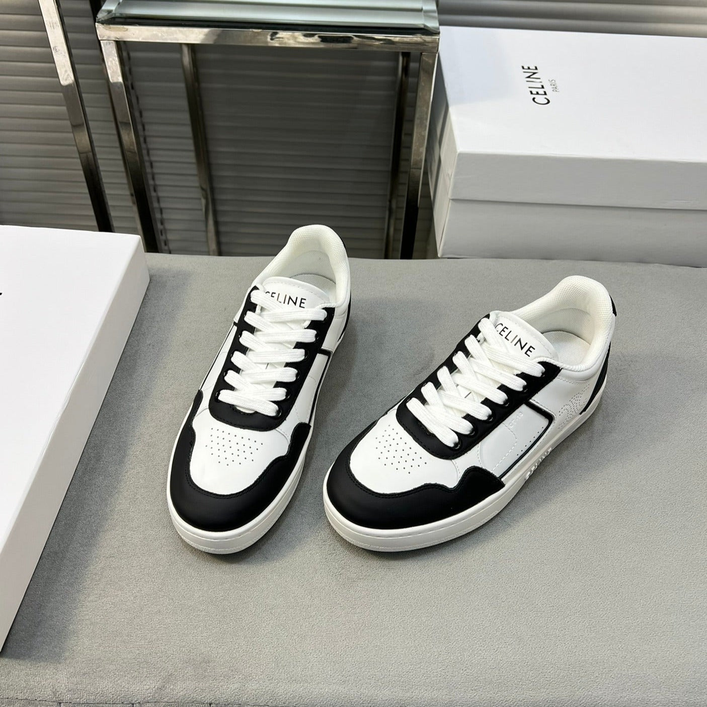 Celine TRAINER LOW LACE-UP SNEAKER IN CALFSKIN, LAMINATED CALFSKIN AND SUEDE CALFSKIN OPTIC BLACK WHITE