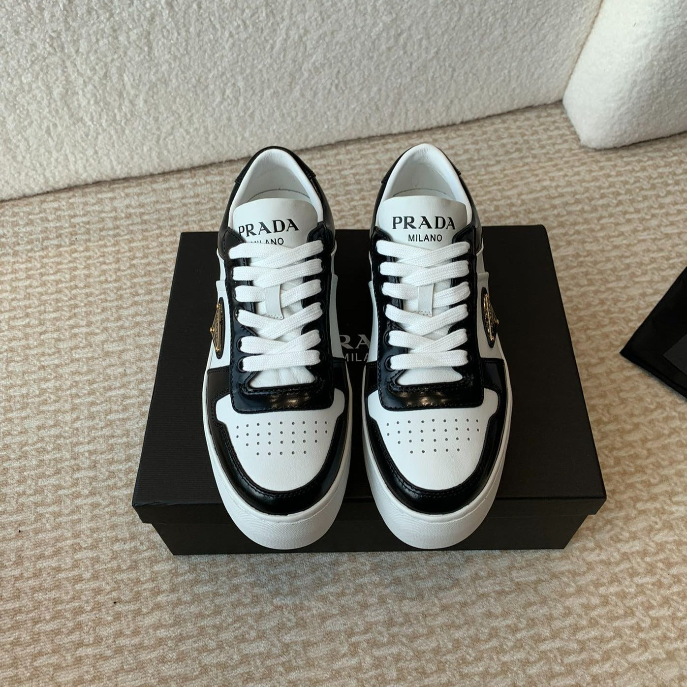 PRADA DOWNTOWN BOLD SNEAKERS BLACK AND WHITE CALFSKIN