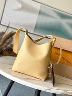 Louis Vuitton LOW KEY HOBO PM 28 IN URBAN YELLOW CALFSKIN GOLD BUCKLE