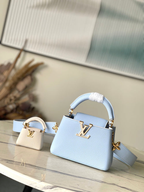 Louis Vuitton CAPUCINES MINI 21 IN CANDY BLUE TAURILLON GOLD HARDWARE