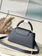 Louis Vuitton CAPUCINES EAST-WEST 33 IN BLACK CALFSKIN GOLD HARDWARE
