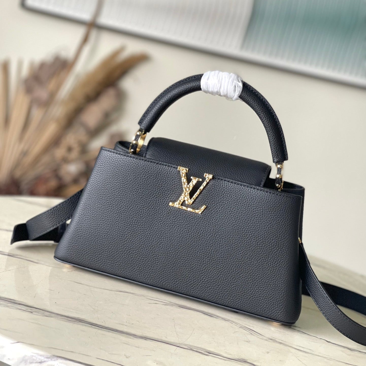 Louis Vuitton CAPUCINES EAST-WEST 33 IN BLACK CALFSKIN GOLD HARDWARE