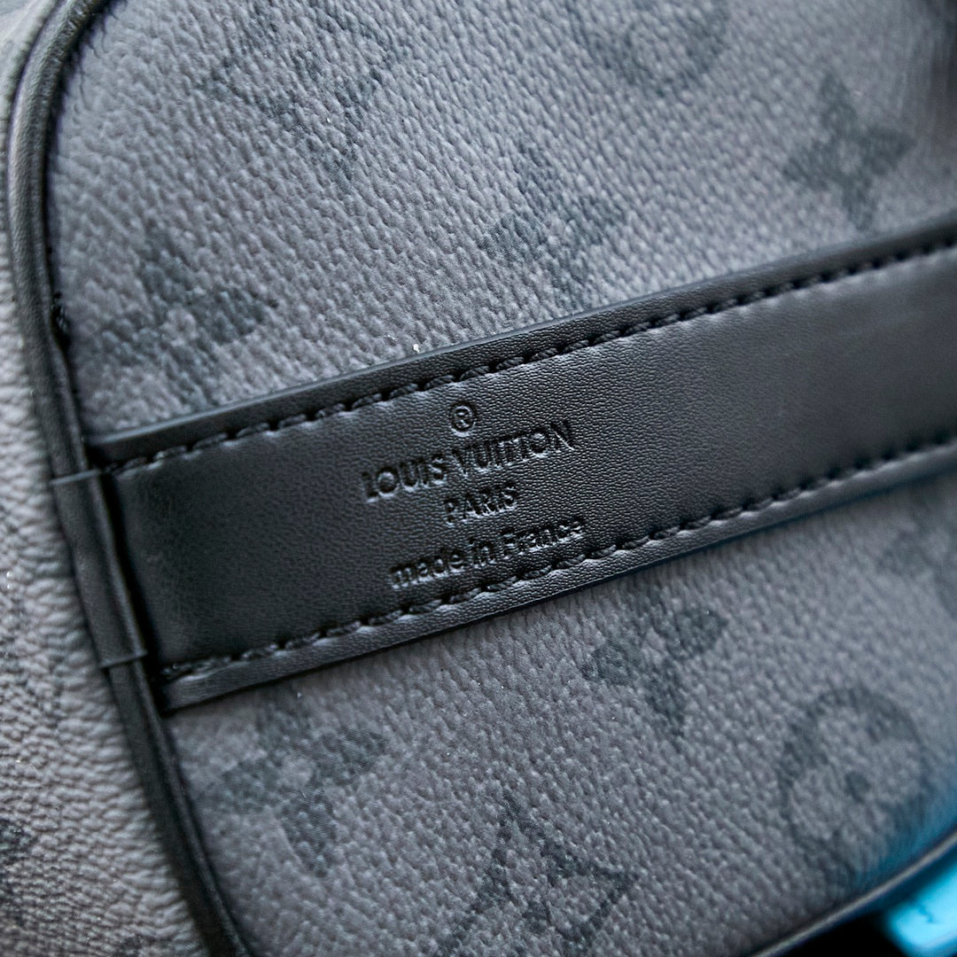 Louis Vuitton KEEPALL BANDOULIÈRE 25 IN GUN METAL MONOGRAM ECLIPSE CANVAS MIX TURQUOISE CALFSKIN