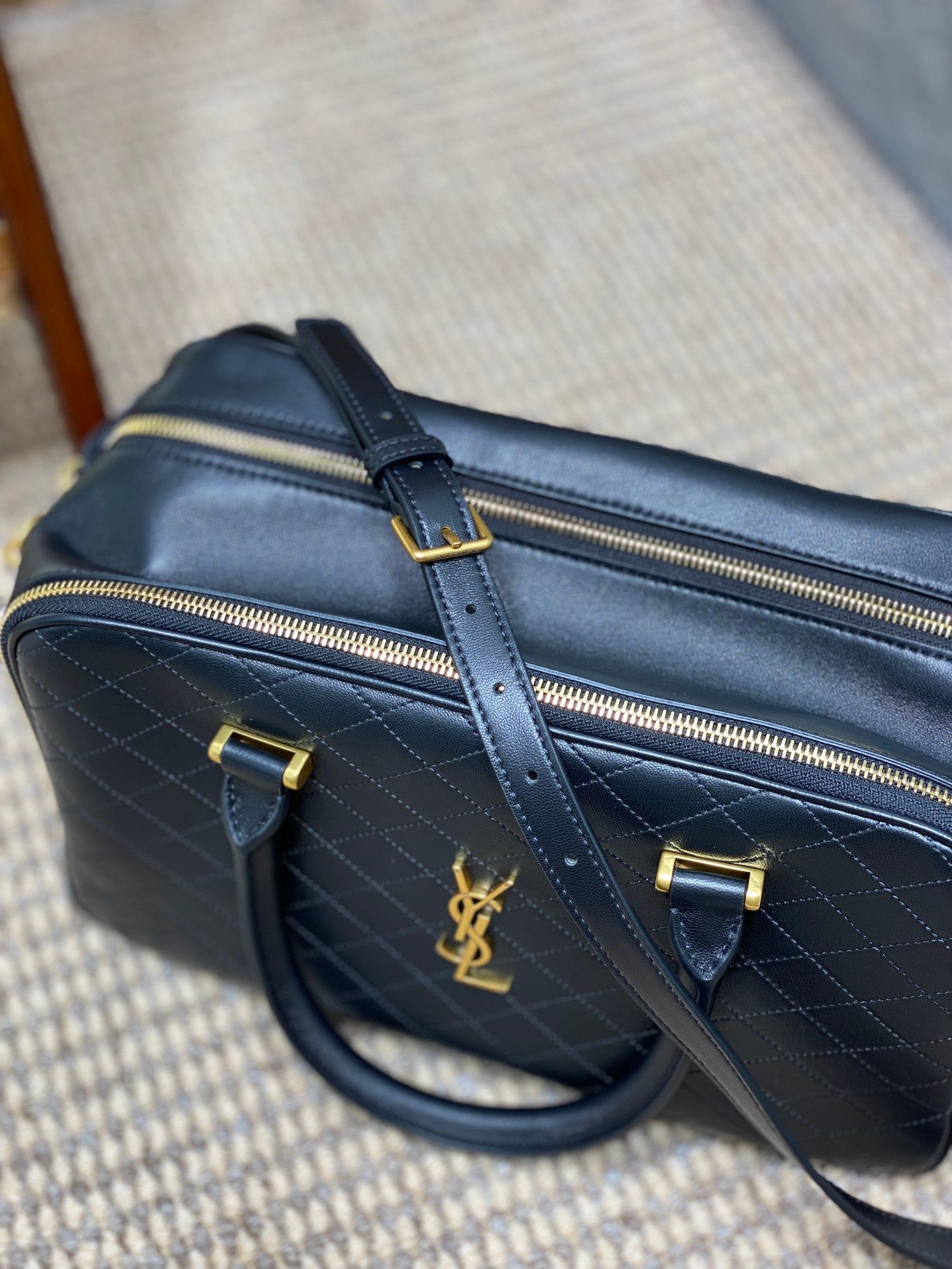 Saint Laurent SMALL TRAVEL BAG 31 IN BLACK QUILTED LAMBSKIN GOLD HARDWARE