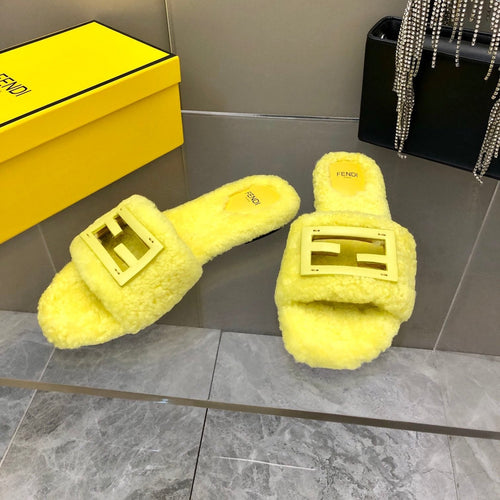 FENDI FENDI BAGUETTE SLIDE SLIPPERS IN BRIGHT YELLOW WOOL