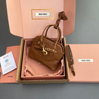AVENTURE BAG 13 IN SANTA FE BROWN SHINY CALFSKIN
