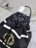 Saint Laurent RIVE GAUCHE BACKPACK 49 IN BLACK MIX WHITE CANVAS