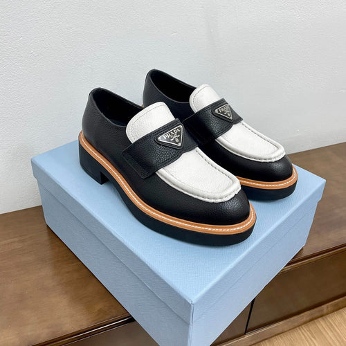 PRADA CHOCOLATE BRUSHED LOAFERS BLACK AND WHITE CALFSKIN