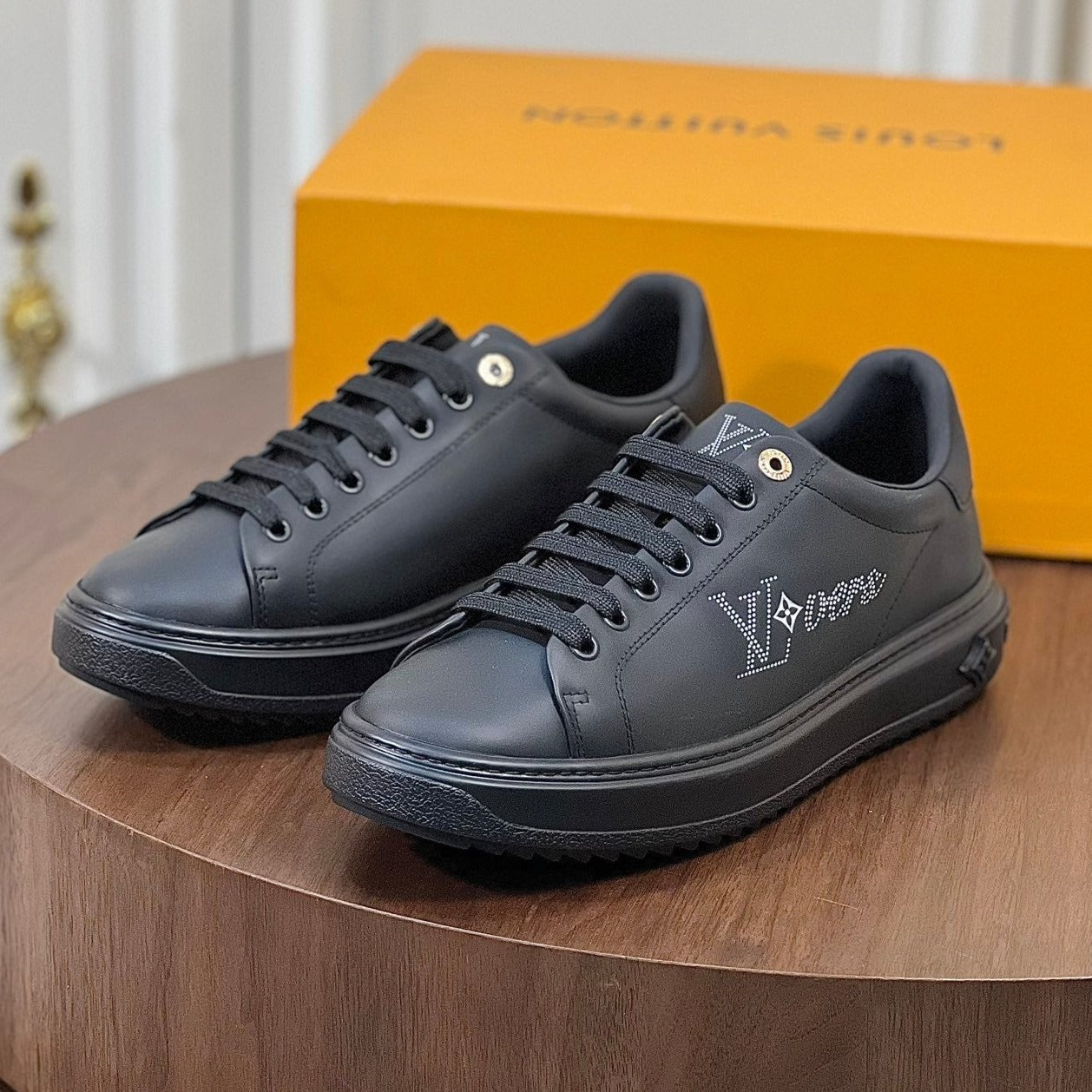 Louis Vuitton TIME OUT SNEAKER IN BLACK CALFSKIN