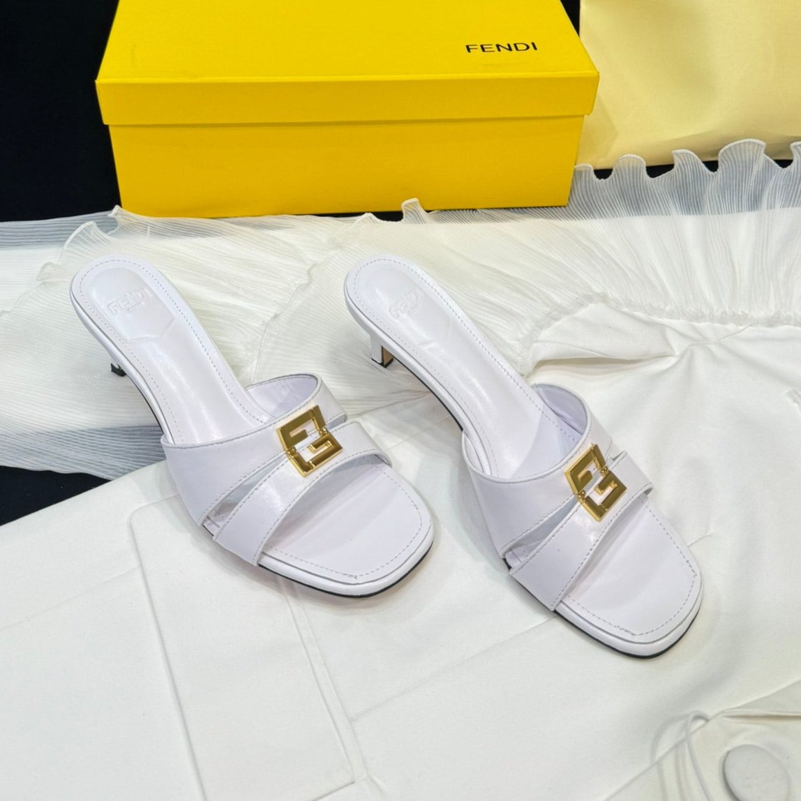 FENDI FENDI MEDIUM-HEELED 55 MM MULE IN WHITE LAMBSKIN WITH GOLD HARDWARE