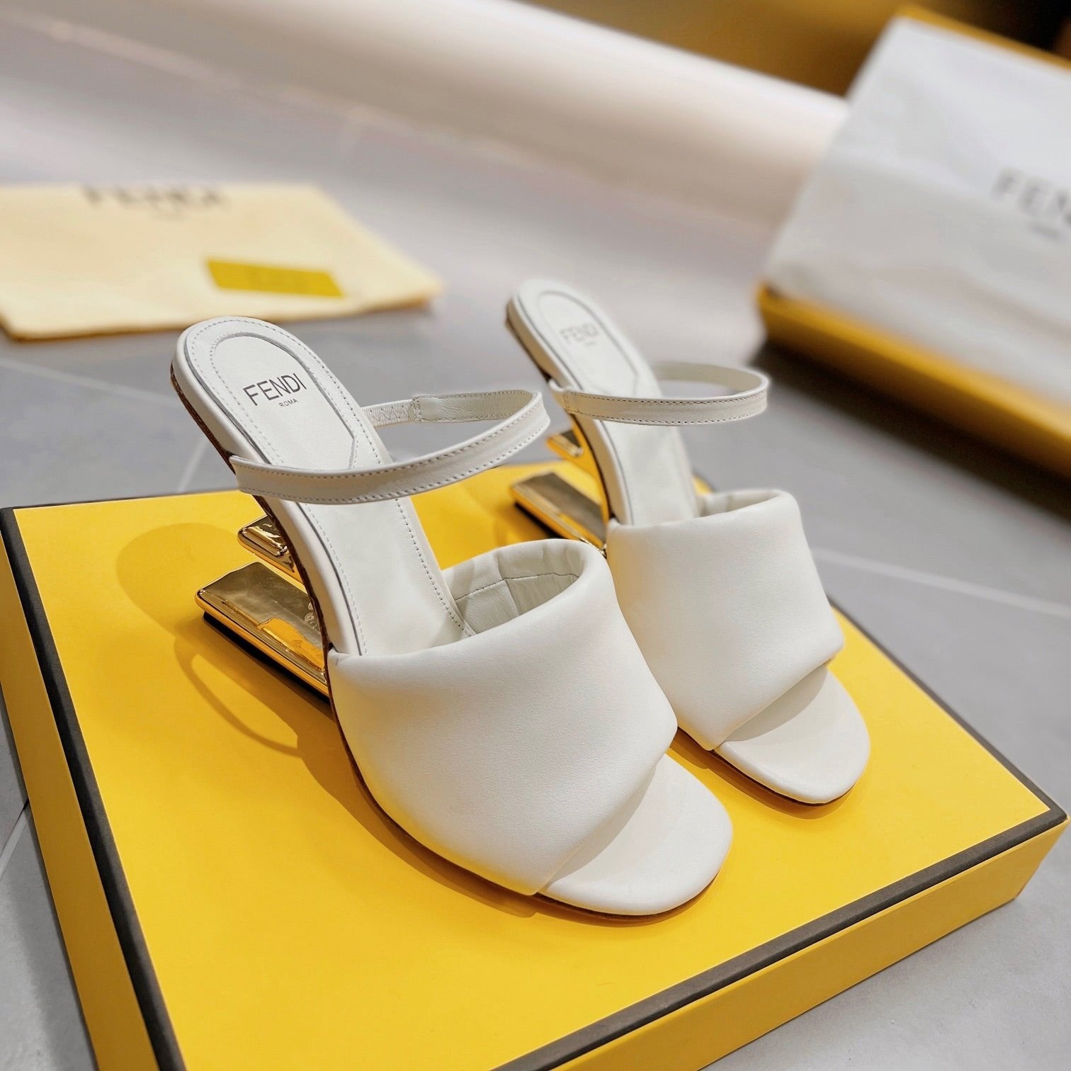 FENDI FENDI BAGUETTE HIGH-HEEL SANDALS 8 CM IN WHITE CALFSKIN
