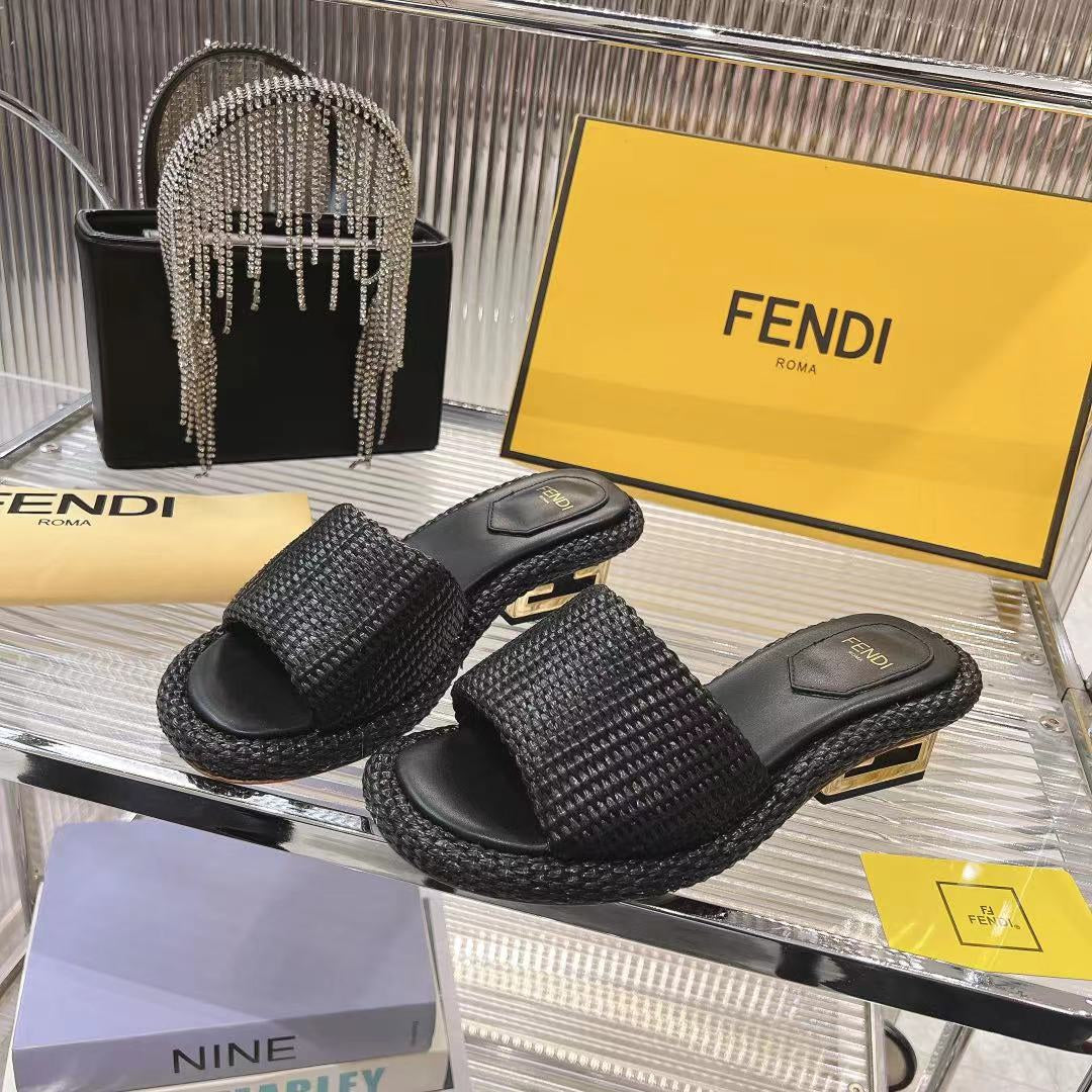 FENDI FENDI BAGUETTE SLIDES WOMEN IN BLACK RAFFIA