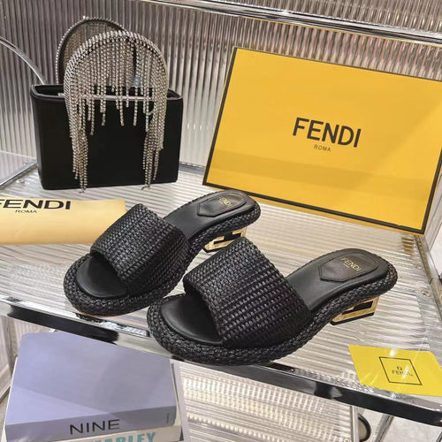FENDI FENDI BAGUETTE SLIDES WOMEN IN BLACK RAFFIA