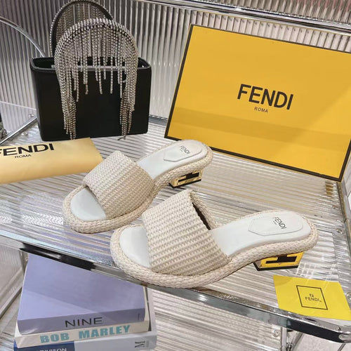 FENDI FENDI BAGUETTE SLIDES WOMEN IN BEIGE RAFFIA