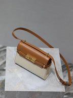 Saint Laurent MANHATTAN MINI 19 IN WHITE CANVAS AND BROWN LAMBSKIN GOLD BUCKLE