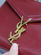 Saint Laurent CASSANDRA MINI TOP HANDLE BAG 20 IN RED CALFSKIN GOLD HARDWARE