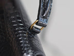 Saint Laurent CASSANDRA TOP HANDLE BAG 24 IN BLACK CROCODILE-EMBOSSED GLOSSY CALFSKIN