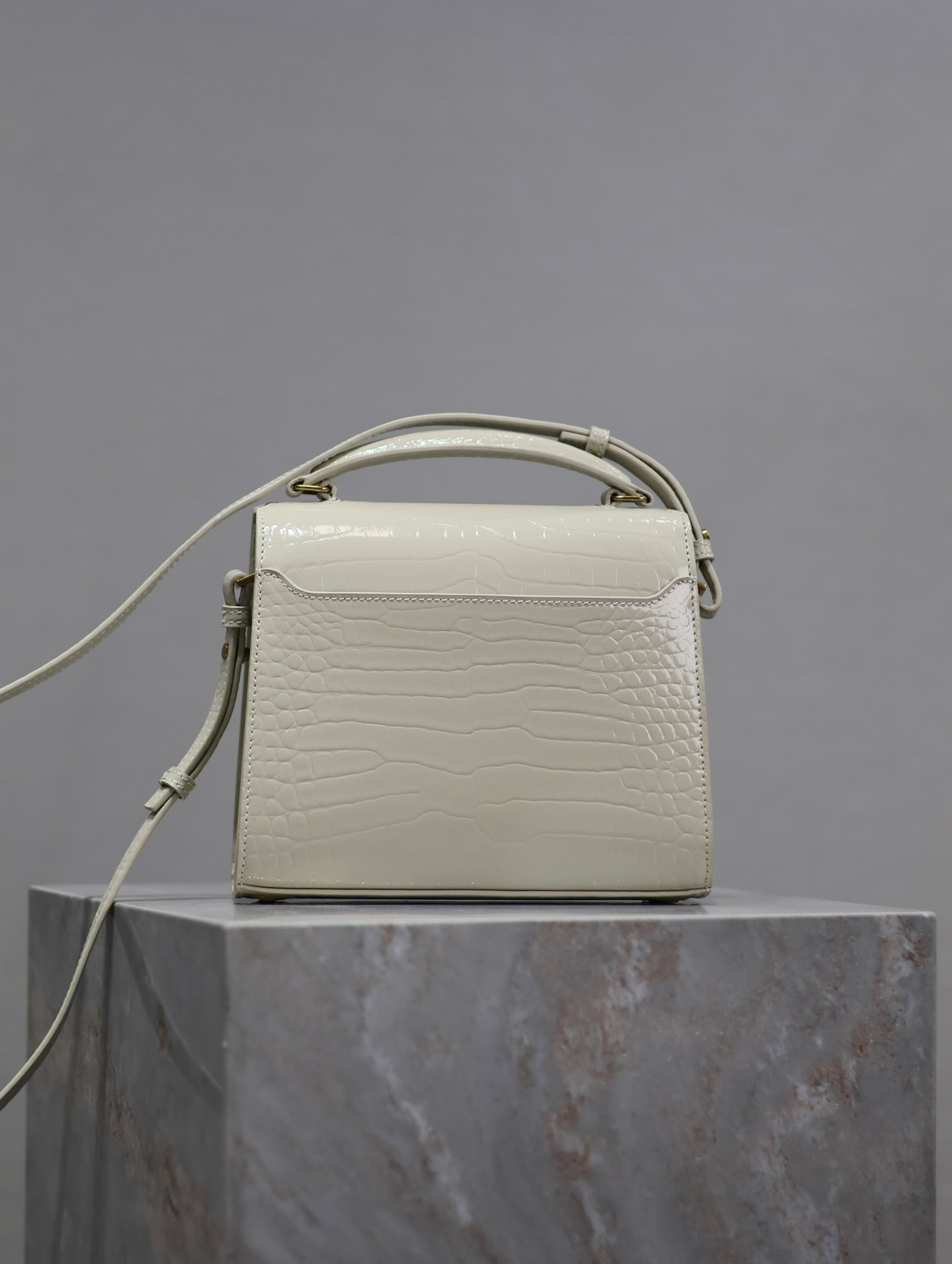 Saint Laurent CASSANDRA MINI TOP HANDLE BAG 20 IN WHITE CROCODILE-EMBOSSED GLOSSY CALFSKIN