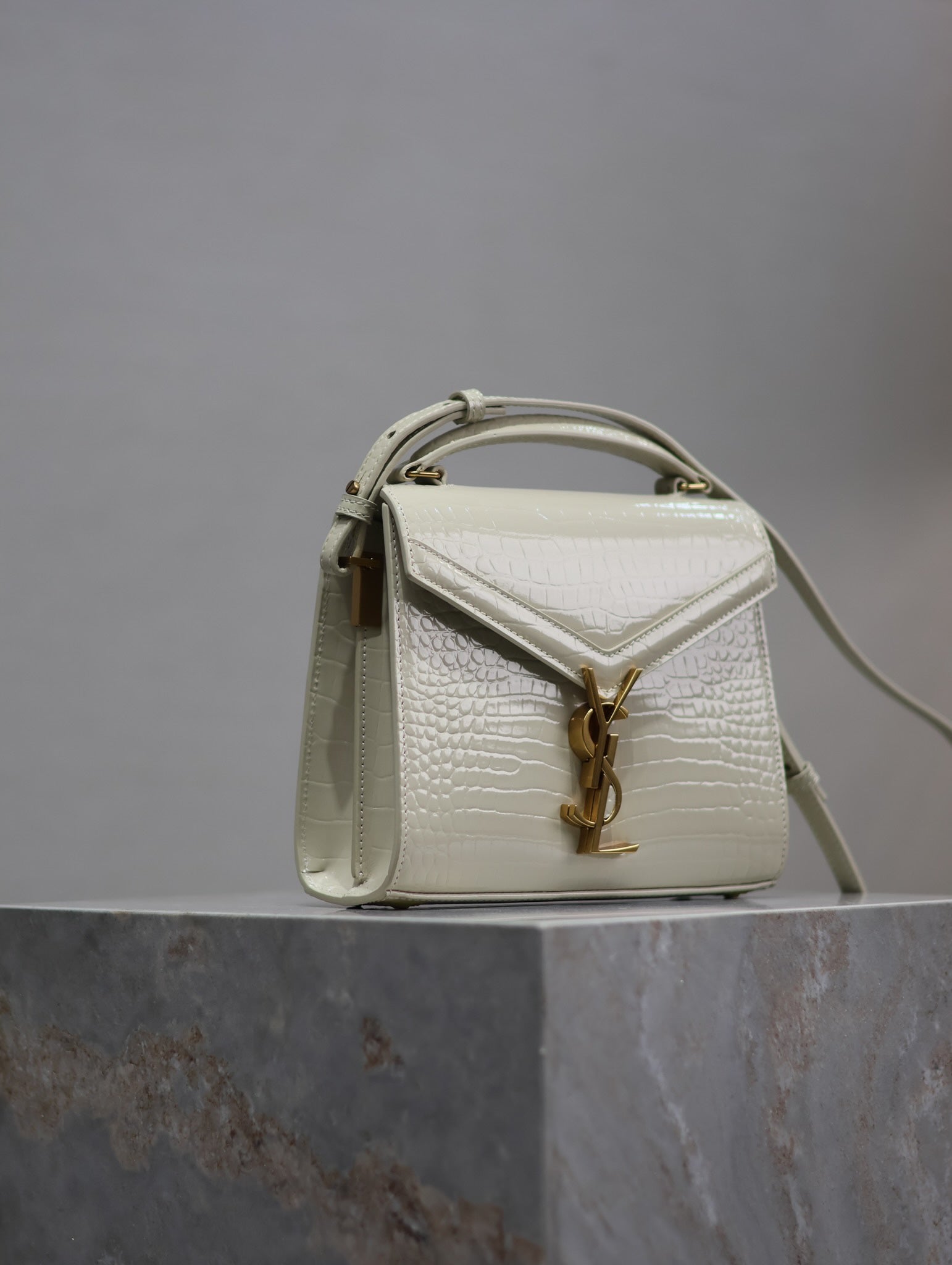 Saint Laurent CASSANDRA MINI TOP HANDLE BAG 20 IN WHITE CROCODILE-EMBOSSED GLOSSY CALFSKIN