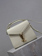 Saint Laurent CASSANDRA MINI TOP HANDLE BAG 20 IN WHITE CROCODILE-EMBOSSED GLOSSY CALFSKIN