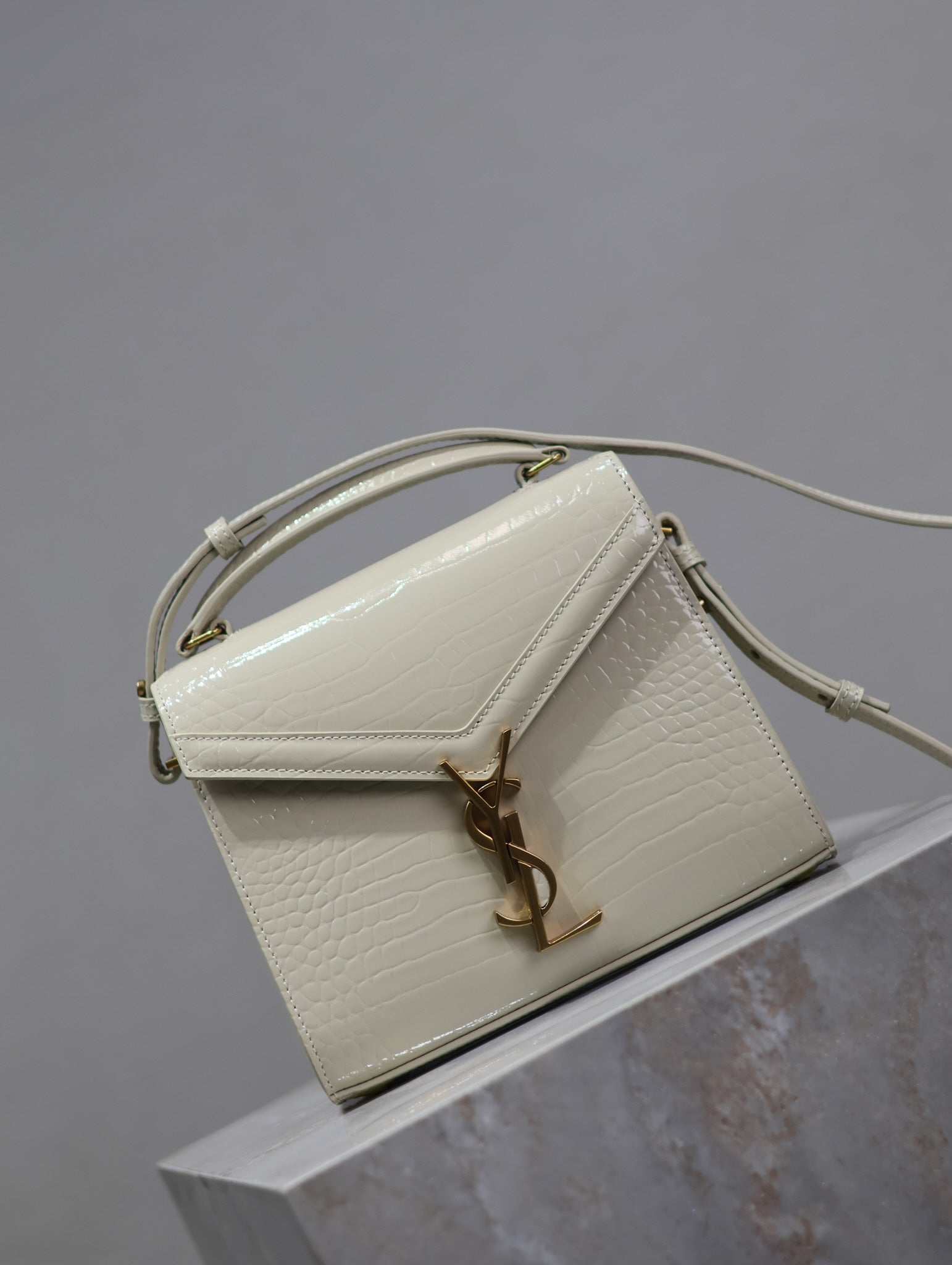 Saint Laurent CASSANDRA MINI TOP HANDLE BAG 20 IN WHITE CROCODILE-EMBOSSED GLOSSY CALFSKIN
