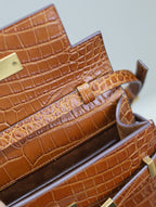 Saint Laurent MANHATTAN SMALL 24 IN BROWN CROCODILE PATTERN CALFSKIN GOLD BUCKLE