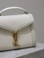 Saint Laurent CASSANDRA MINI TOP HANDLE BAG 20 IN WHITE CANVAS AND LEATHER TRIM