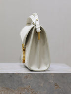 Saint Laurent CASSANDRA MINI TOP HANDLE BAG 20 IN WHITE CANVAS AND LEATHER TRIM
