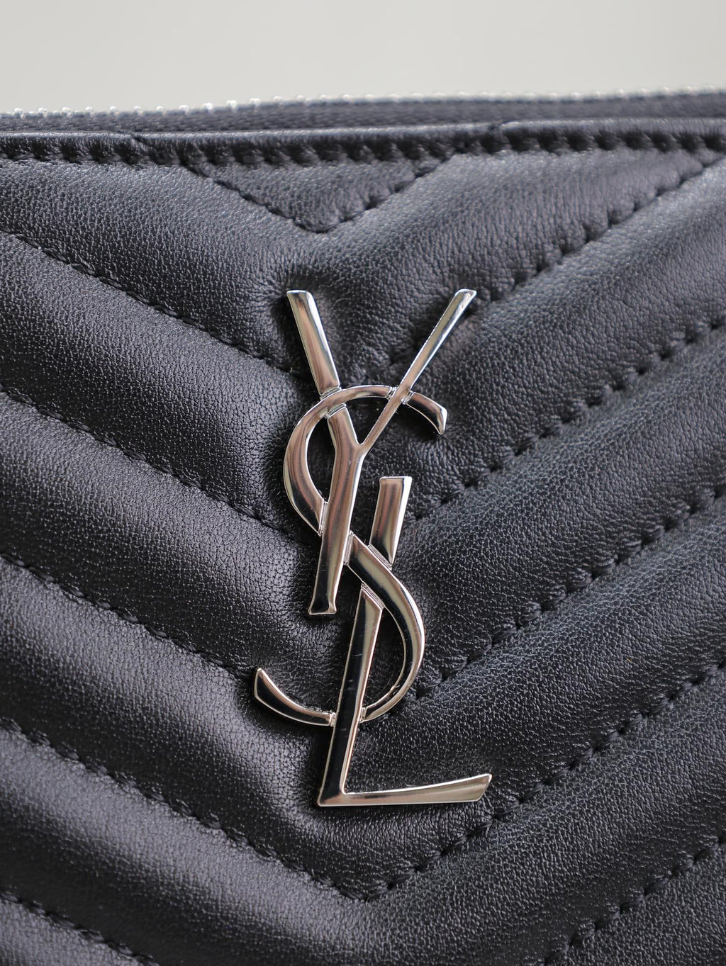 Saint Laurent CLUTCH 24 IN BLACK QUILTED CALFSKIN SILVER BUCKLE