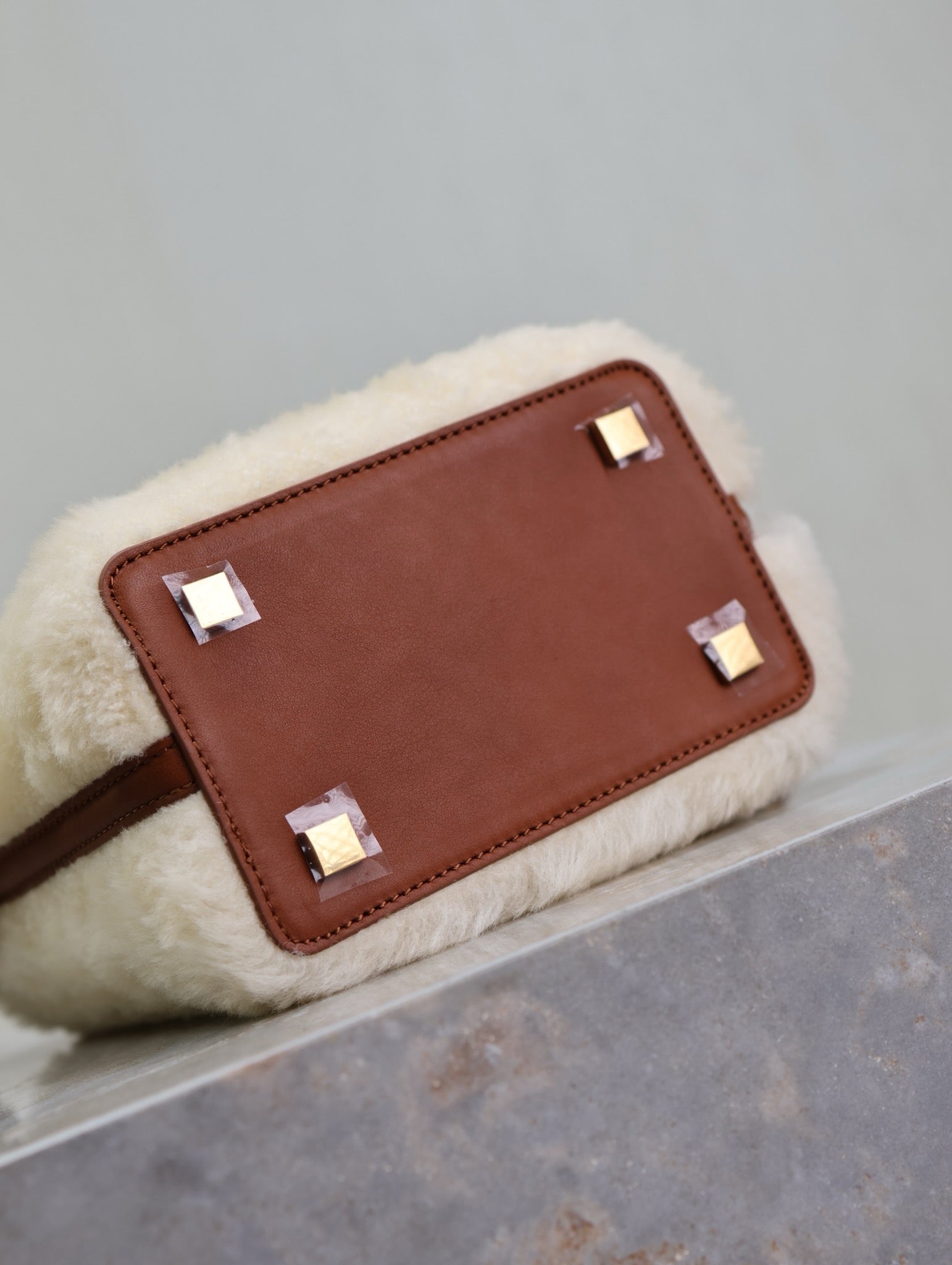 Saint Laurent LE 37 MINI BUCKET BAG 15 IN CREAM SHEARLING AND BROWN LEATHER TRIM