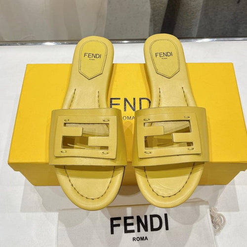 FENDI FENDI BAGUETTE SLIDES IN BRIGHT YELLOW LAMBSKIN