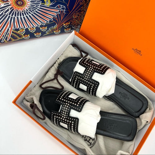 HERMES rivet oran sandals in black leather