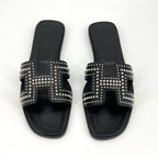 HERMES rivet oran sandals in black leather