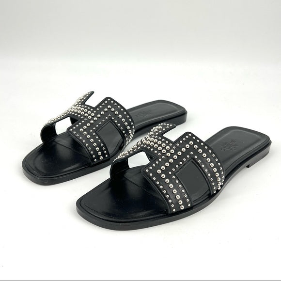 HERMES rivet oran sandals in black leather