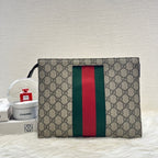Gucci clutch monogram