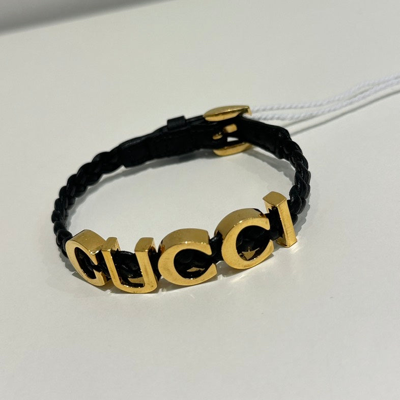 GUCCI Interlocking G Black Gold Bracelet