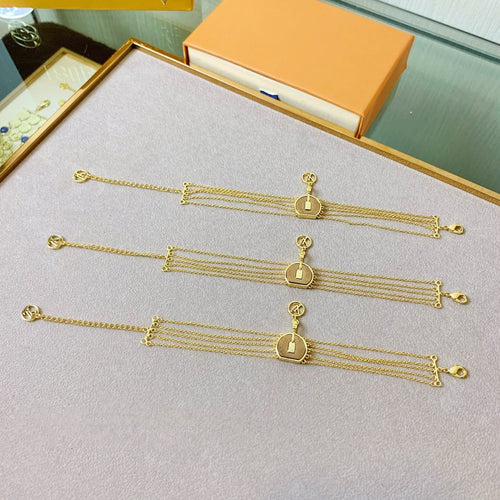 Louis Vuitton MINI ROUND CAKE BAG TAG PRESBYOPIA MULTI-CHAIN BRACELET