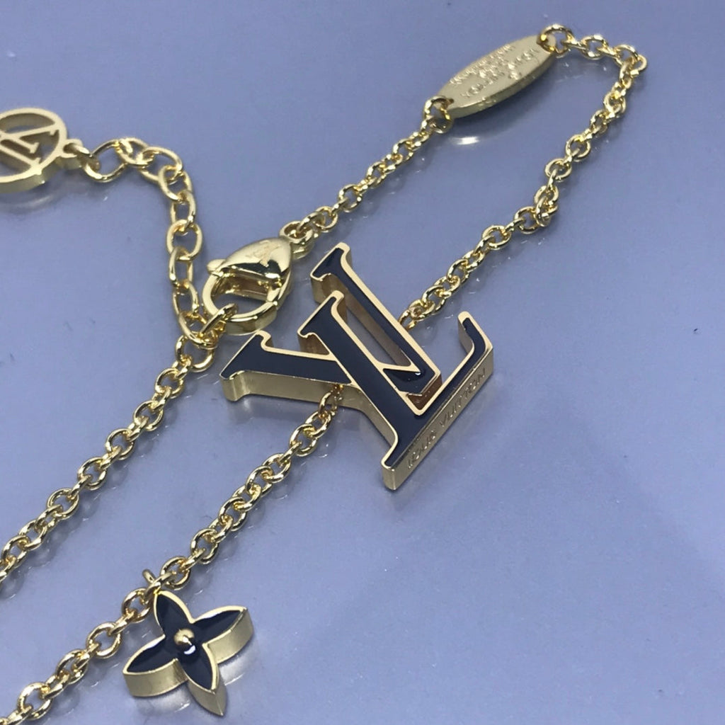 Louis Vuitton MONOGRAM PINK AND BLACK GOLD BRACELET